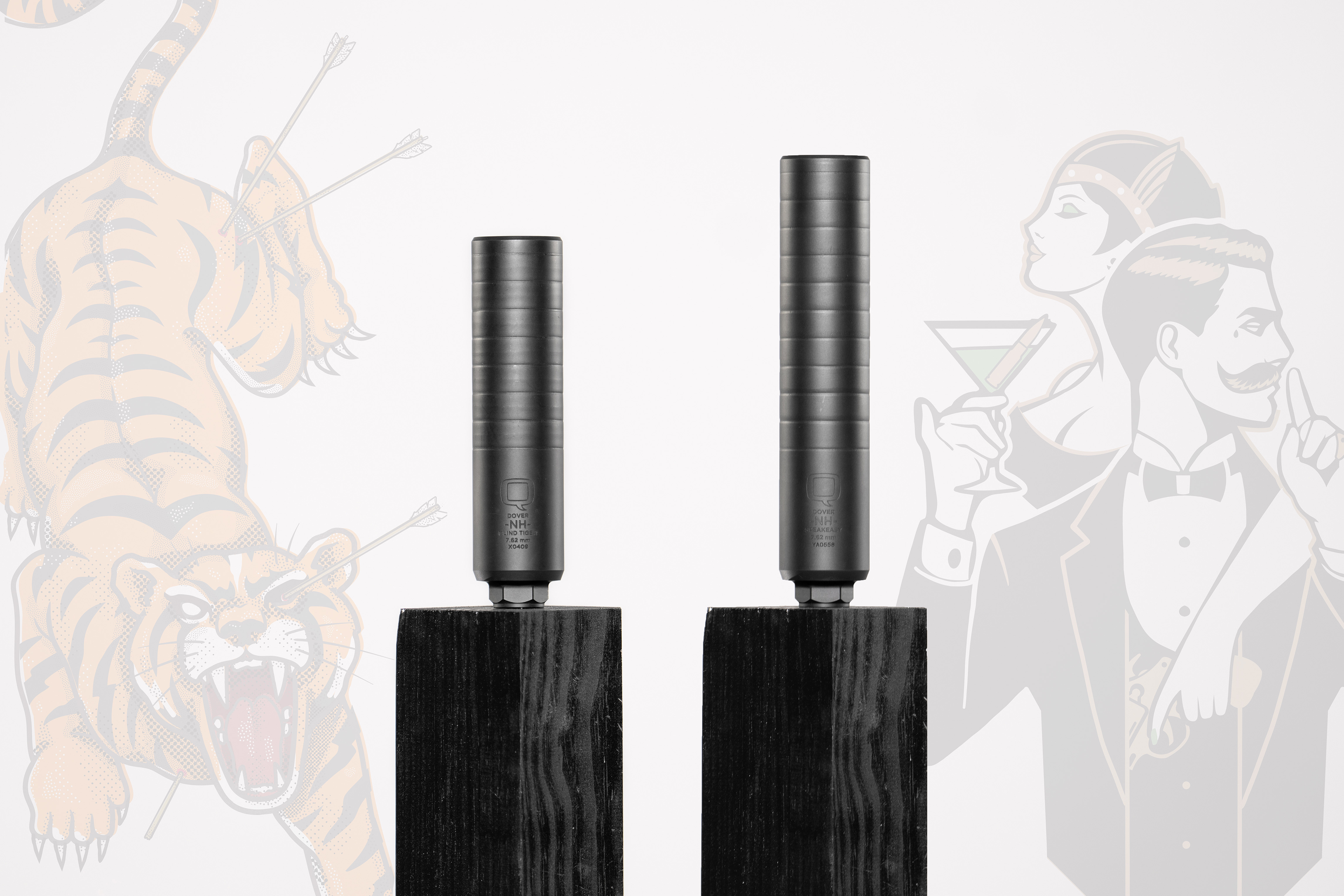 Side-by-side comparison of two Q suppressors — the Blind Tiger (left) and Speakeasy (right) — each mounted vertically on black wooden pedestals. In the background, the Blind Tiger is paired with a stylized illustration of a roaring tiger with arrows in its back, while the Speakeasy is accompanied by a flapper-era couple dressed in formalwear. The backdrop is minimalist with faded artwork, letting the suppressors stand out in the foreground.